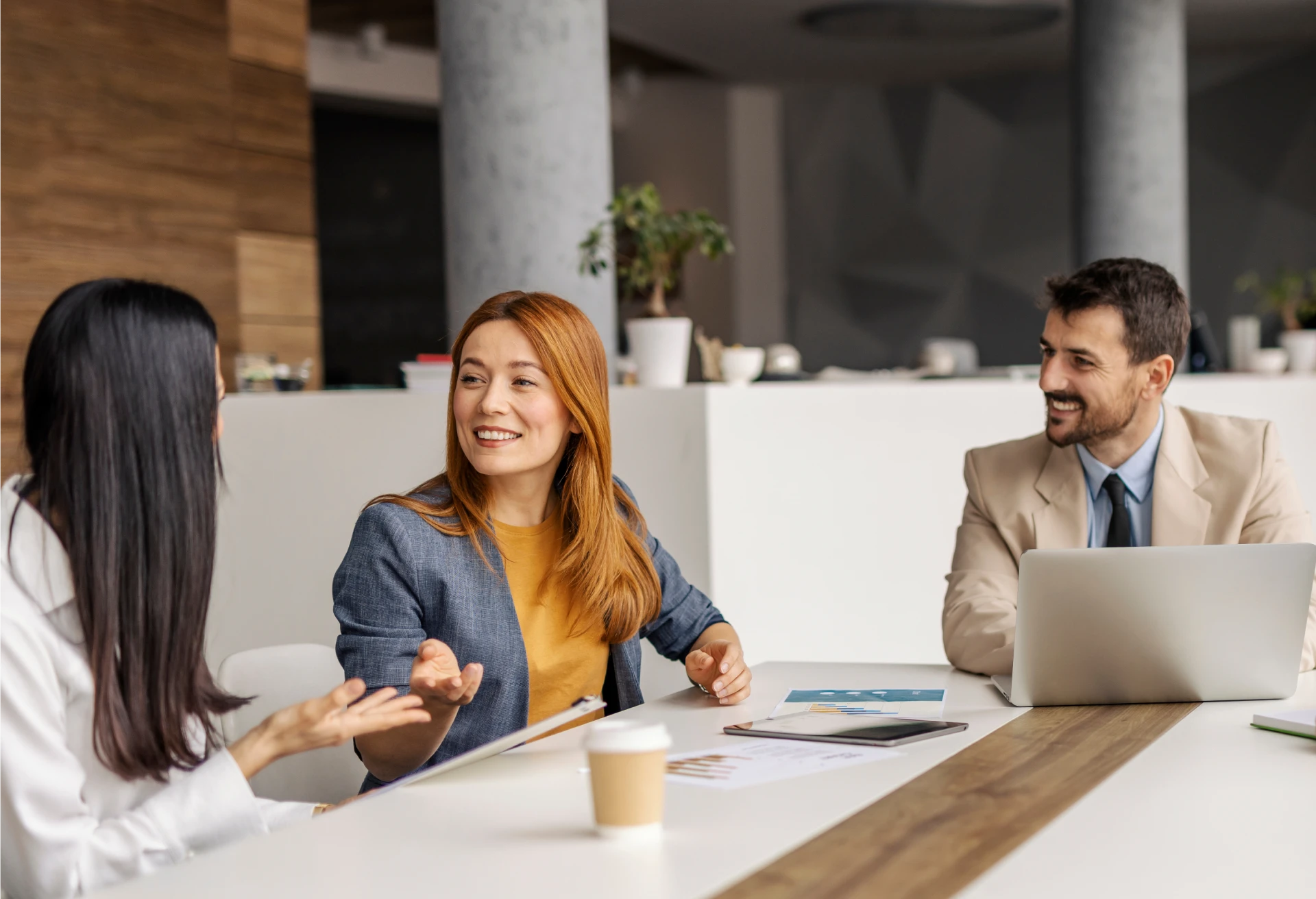 Colleagues engaged in a work conversation